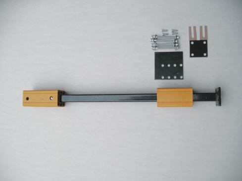 The TimberTech/Azek Secure-Mount post is sold separately from the install kit, which includes an adjusting plate and adjusting screws along with a reinforcing bottom plate and bolts. The top block has set-screw locations to lock onto the post for 36- and 42-inch-high railings. 