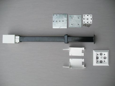 The UltiMount ProSpec kit comes with a galvanized surface plate and bottom plate, plumb adjusting bolts and nut plate, and a post-sleeve spacer and skirt. Not included are 5/16-inch-diameter mounting bolts. 