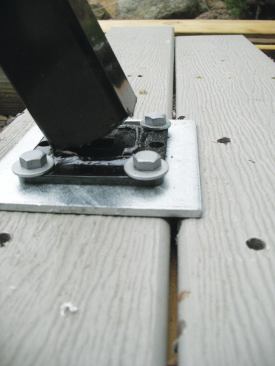 While the reinforcing plates of the UltiMount ProSpec prevent the bolts from pulling through or splitting the blocks, the weld between the thin-wall steel post and the plate snapped at a little over 350 lb.