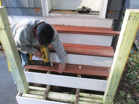 The pre-finished Meranti Batu treads were fastened to the stringers with 2-inch stainless steel finish nails, two nails per shim screw location. 