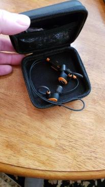 The ISOTunes Pro 2.0 comes with a soft storage case with room for extra ear tips and cord clips.