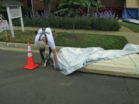 When we store materials outdoors, we cover them with 6-mil plastic sheeting or tarps secured with ropes or bungee cords.