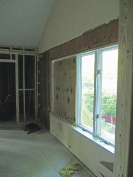 Sheets of plywood screwed over rough openings from the inside will discourage unwanted visitors.