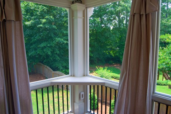 The beauty of PVC trim is its versatility; here it's used to create a maintenance-free corner nook on a porch.