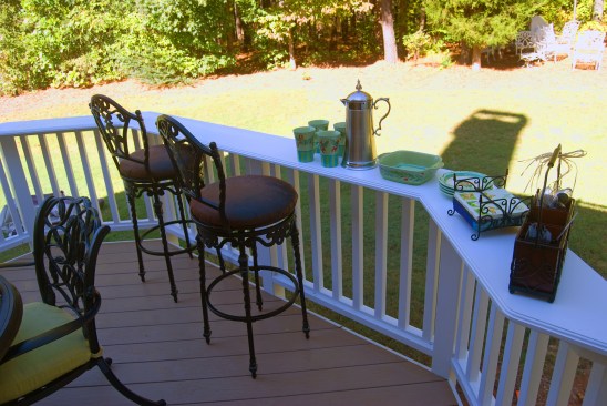 Bar tops, serving stations, and food staging areas are easily created using 5/4-in. x 12-in. PVC material on top of the rail. This approach creates an activity zone with a minimal infringement of space. In addition to profiling the top edge, the author also rounds over the bottom edge with a router to protect the legs of someone seated at the counter.