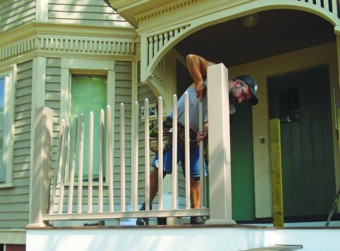 The precut balusters are already fitted with end plugs, which fit into the slots in the bottom rail.