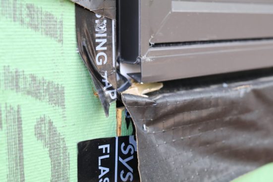 Now the red flags are really raised! Anytime you see bare wood and 90-degree cuts on straight flashing, there will be issues.