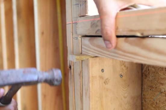 Shims make an easy fix to this flat framed sill.