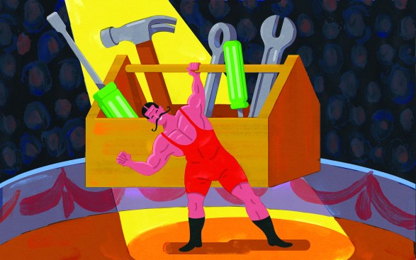 Strongman holding up a box of tools