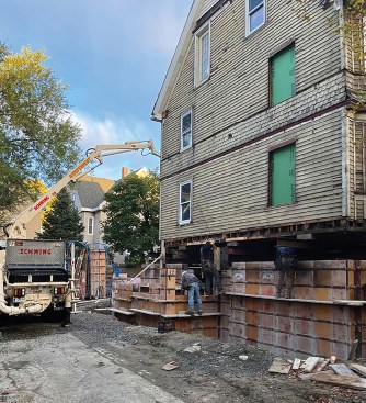 Due to lot limits, the formwork contractor had to use a smaller pump truck than usual. About 80% of the pour was done with the pump from the driveway, and the remaining 20% on the far side of the house had to be “dragged” into place.