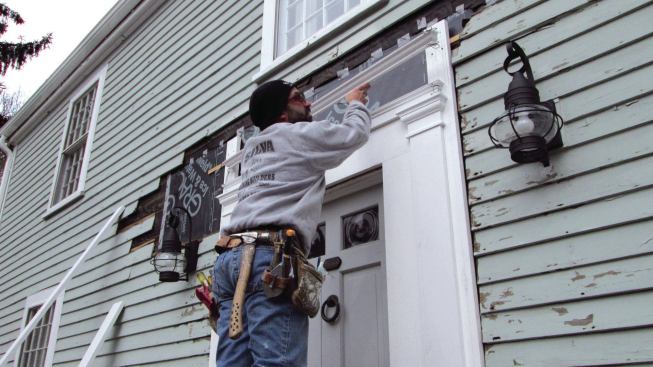 I pre-assembled all the moldings as “kits” at my workbench, starting with the architrave—a simple flat board with molding—which I placed on top of the capitals.