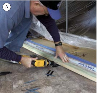 To support the sill, the author fastens a piece of PT lumber to the foundation over plastic shims.