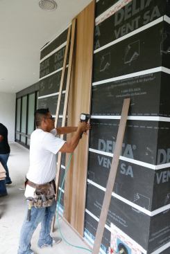 For this job, which called for vertical siding, Coroplast strips were attached horizontally.