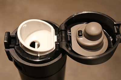 The Zojirushi mug has a nice rubber gasket that makes it spill-proof and therefore airtight too.