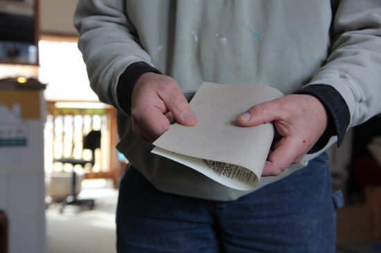 Fold the sheet in half lengthwise.