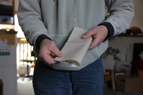 Now fold the sheet in half going the other direction.