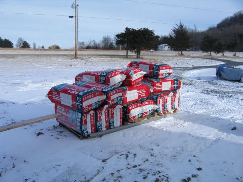 There are eight 3 ½-inch batts to a bag, which covers 60 square feet, and because each bag of Roxul was wrapped in a heavy plastic film, I could leave it outside without worrying about rain or snow damage.