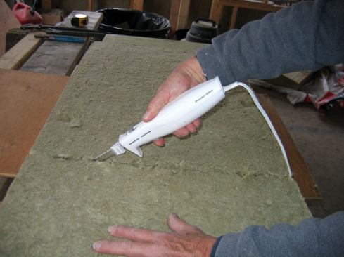 A serrated bread knife works well, but what worked beautifully for me was a $15 electric carving knife.