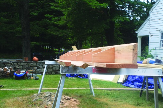 The author adjusted for 2 1/2 inches of the more than 5-inch drop over the width of the building face.