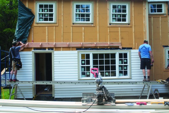 The crew packed out the wall with Gutex insulation and strapping.