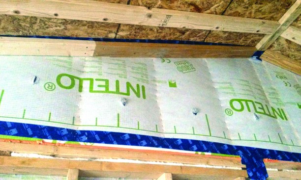 Intello smart vapor retarder fabric was wrapped up the gable wall.