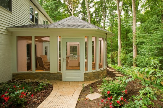 Another benefit of the conical roof design is that it doesn't obstruct views of the nearby woods from the home's second-floor windows.