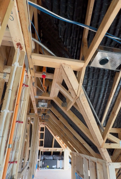 In each bay, the battens are covered with sturdy plastic baffles, shown here before the spray foam roof insulation was applied in each bay.