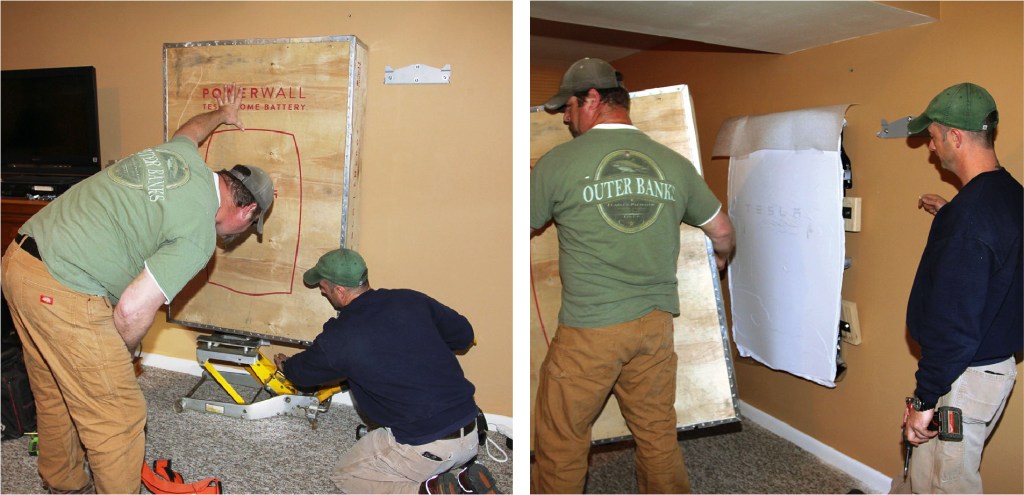 The Powerwall in its plywood shipping crate is jacked up and mounted, then unboxed.