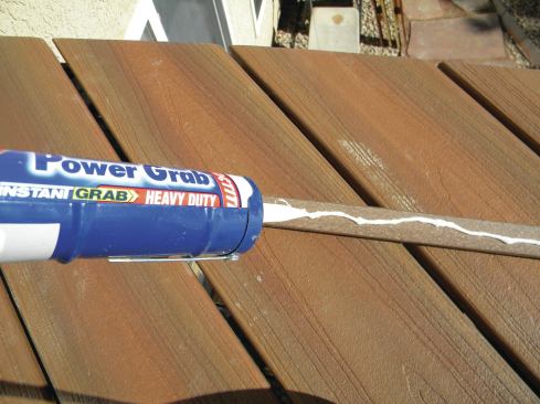 Loctite Power Grab adhesive is spread onto the back of the trim prior to installation. Power Grab

dries clear, so if any squeeze-out is missed during cleanup, it’s usually unnoticeable.