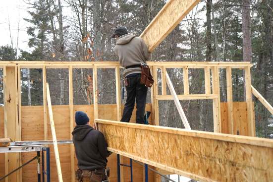 The crew frames a long span.