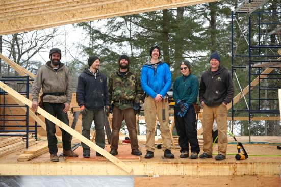 The crew frames a long span.