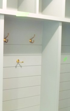 The author plans layout to avoid “slivers,” or narrow lengths, at the top or bottom of a horizontal run when installing shiplap within a shelving unit ...