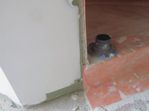 Whether a sheet membrane or liquid-applied, the liner needs to cover the top of the curb, extend down the outside face, and lap onto the floor.