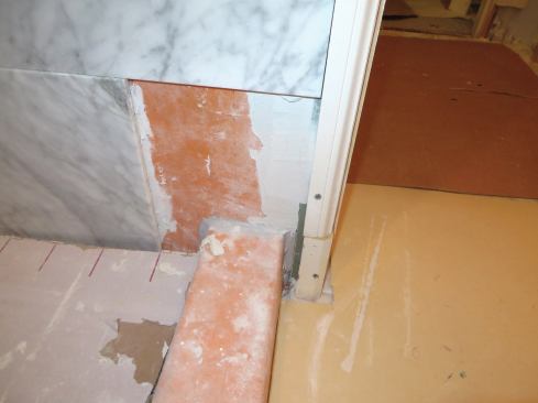 This application, like the one in the previous slide, left critical gaps in the waterproofing where cracks in the grout are apt to form.