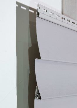 Vinyl siding profiles that have broader butt edges tend to be more rigid and to stay straighter than designs that have shallower butts. This siding doubles over the nailing hem completely for more strength.