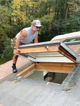The roof had a relatively shallow, 5/12 pitch, so traction was good.