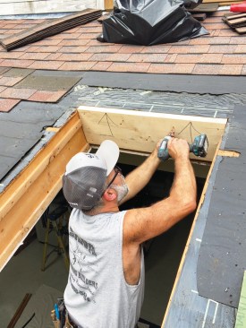 Because the new units were slightly shorter than the existing ones, I installed 2x10 fillers at the tops of the rough openings.