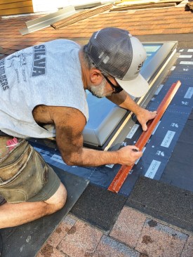 After the new skylight was in place, I laid out the position of the flexible flashing (supplied as part of the Velux installation kit) used to seal the skylight frame to the flashing-covered roof deck, to ensure that it wouldn’t interfere with the manufacturer’s metal flashing.
