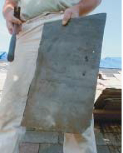 Sound slates make a crisp ringing sound when struck with a hammer. This piece, salvaged from an old Vermont barn, could provide another hundred years of service on a roof.