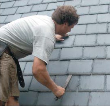 Removing a cracked slate is quick and simple with a slate ripper.