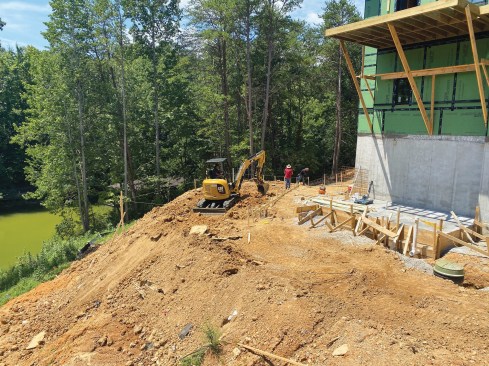 Site work began while the house was still under construction.
