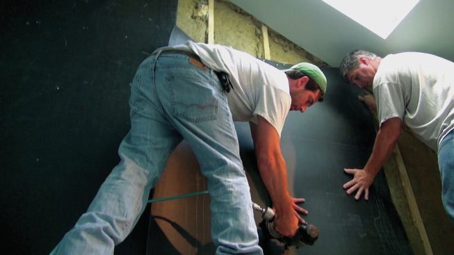 Though heavy, the material cuts easily with a drywall knife.