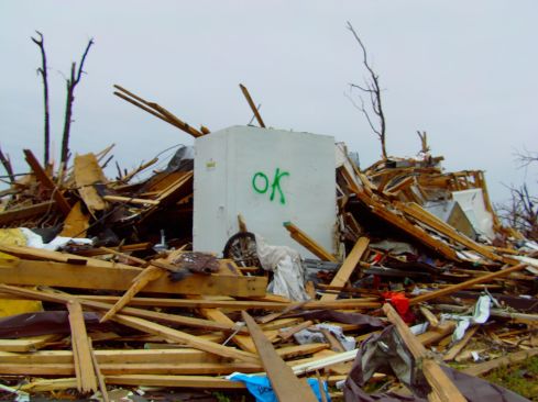 A Joplin resident survived the 2011 tornado by hiding in this Twister Safe steel storm shelter, as the building around it was reduced to splinters.