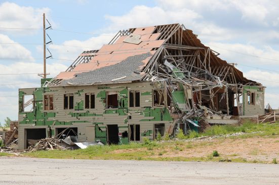 A family sheltered in the basement of this shattered building during the 2011 Joplin, Mo., tornado.