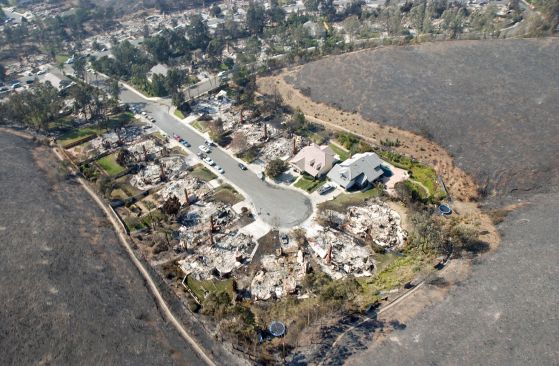 Wildfire entered this neighborhood in the Scripps Ranch area of San Diego and burned multiple houses in fall of 2003. U.S. Navy photo by PH2(AW/SW) Michael J. Pusnik, Jr.