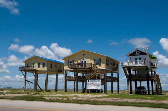 Gilcrest, Texas, August 16, 2009--Elevated homes constructed under upgraded standards of the IBHS Fortified program, which survived the arrival of Hurricane Ike, are the only structures standing in the town of Gilcrest after most of the area was scraped clean of structures by Hurricane Ike's storm surge. Photo by Patsy Lynch/FEMA