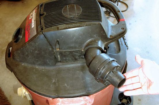 ... and a vac muffler, which reduces volume and mellows out the shrill pitch of a vac, making it much more pleasant to work with in a closed space.