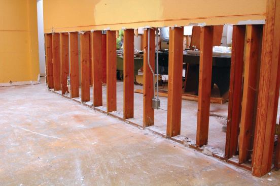 After even shallow flooding, cutting back drywall 48 inches off the floor reduces finish labor.