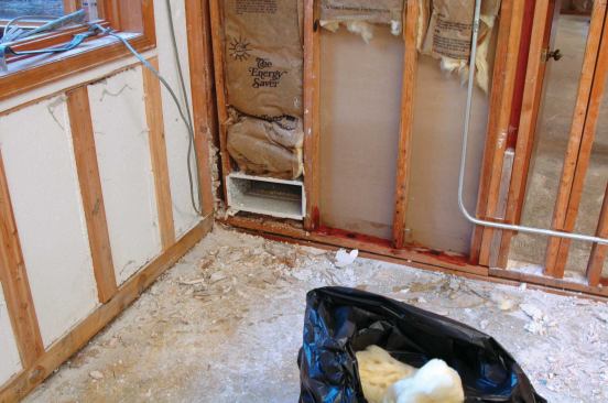 HVAC ducts need to be drained and cleaned inside and out. Also note that the window trim is left in place, leaving a 2-inch strip of drywall for taping when patching the joint.