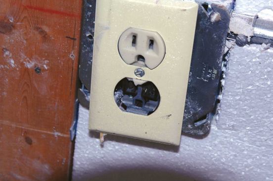 Even when dried out, flooded electrical devices could contain sediment or other fine debris. This receptacle seemed fine but blew up after a few minutes of use.